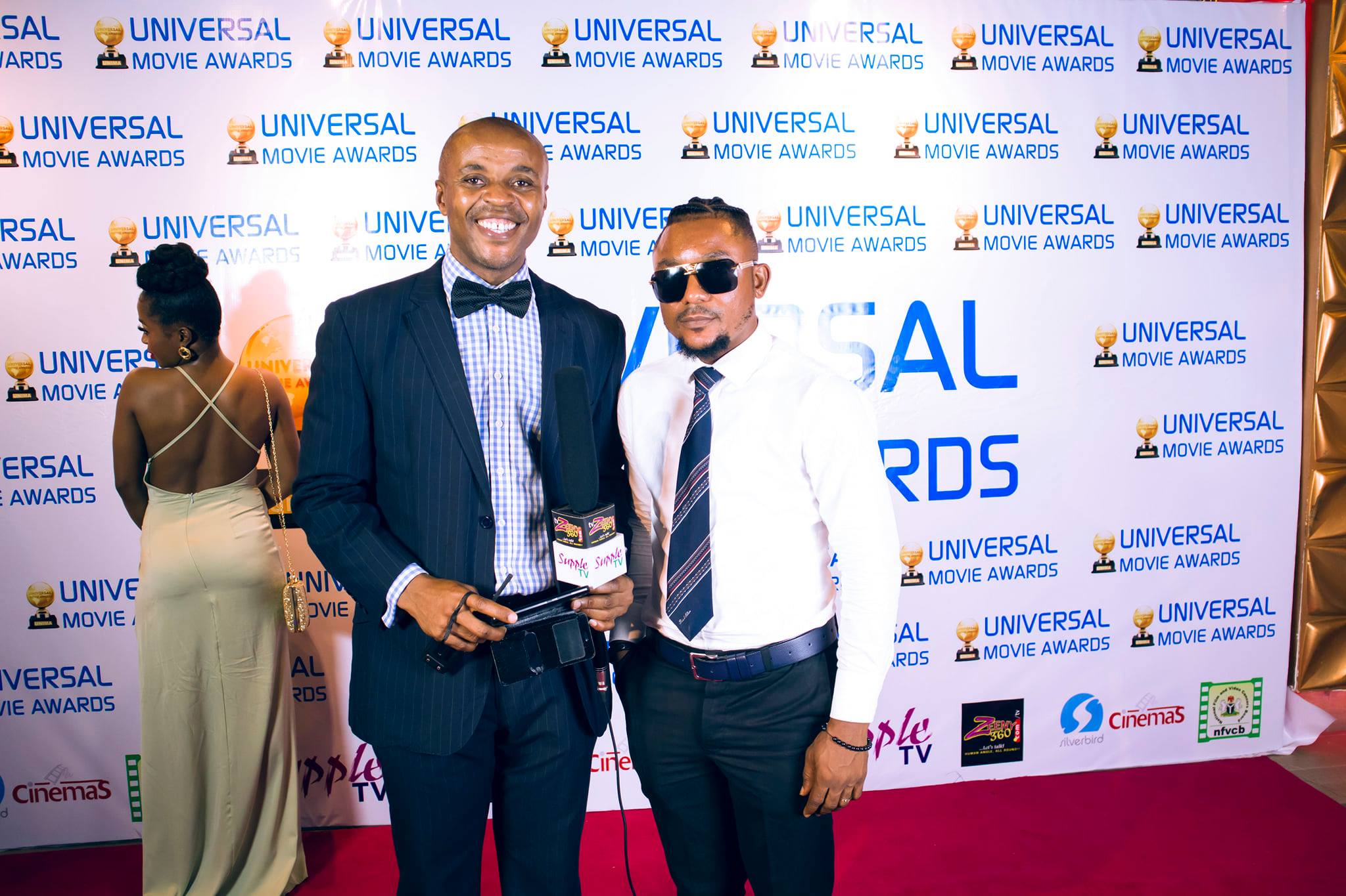 Deceased Nanje Ramesh (on the right) after a red-carpet interview by Eze Victor Uwaezuoke at the Universal Movie Awards where he was nominated as one of the Best Supporting Actor Nominees.